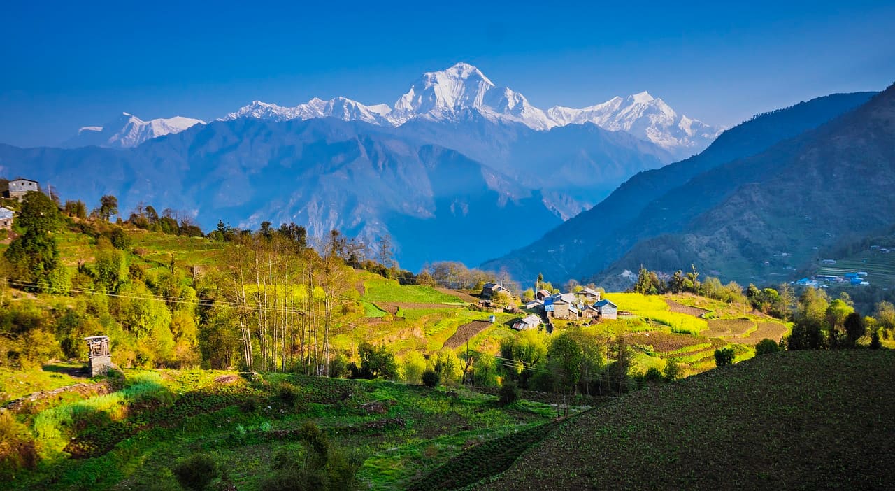 Himalayan Mountain in background of village